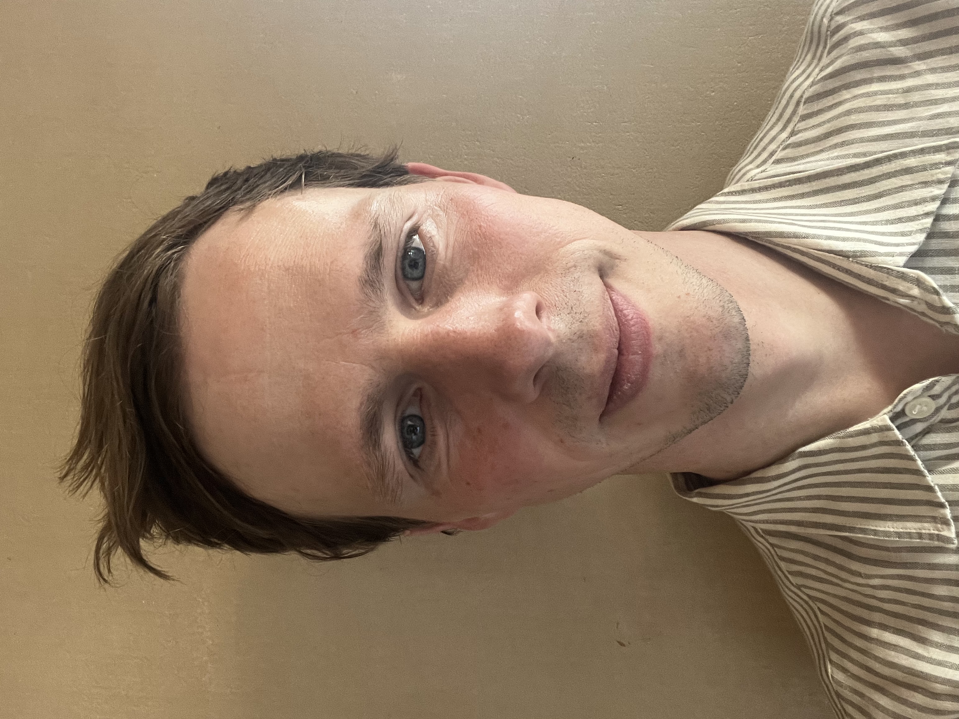A selfie of Ed Davison taken in Kefalonia, now used as his work pass photo at Which?.